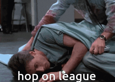 a man is laying on the floor with the words hop on league written above him