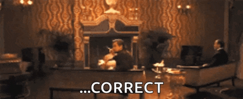 a blurry picture of a man holding a knife and the words `` correct '' written next to him .