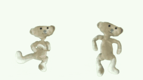a stuffed animal is surrounded by hundred dollar bills falling from the sky .