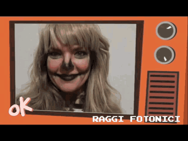 a picture of a woman with black paint on her face and the words ok on the bottom right