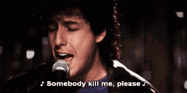 a man singing into a microphone with the words " somebody kill me please " below him