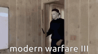 a man in a mask is holding a knife in a doorway with the words modern warfare iii below him .