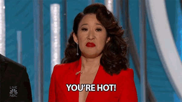a woman in a red suit says " you 're hot "