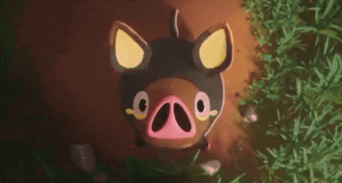 a pig is standing in the middle of a flower garden .