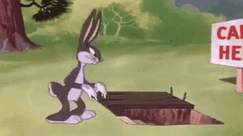 bugs bunny is standing in a hole in the ground next to a sign that says caution .
