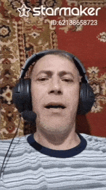 a man wearing headphones with a starmaker id displayed on the bottom
