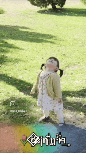a little girl is standing in the grass with the name sisi bigface written below her