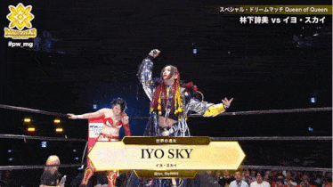 a woman in a wrestling ring with the name iyo sky on it