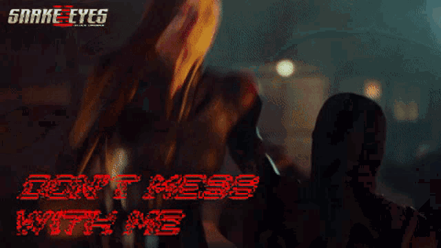 a poster for snake eyes shows a man in a dark room