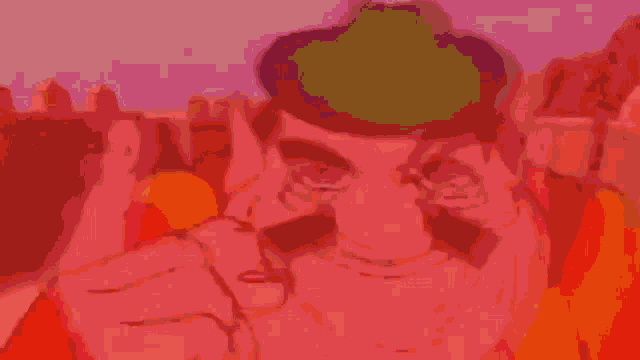 a pixelated image of a cartoon character with a red shirt on