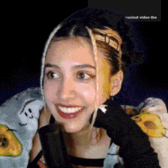 a close up of a woman 's face with the words " craziest video tho " in the corner