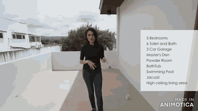 a woman standing on a balcony with the words 5 bedrooms 6 toilet and bath 3 car garage master 's den and powder room