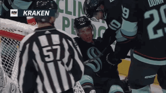 a hockey game is being played between the kraken and the kings