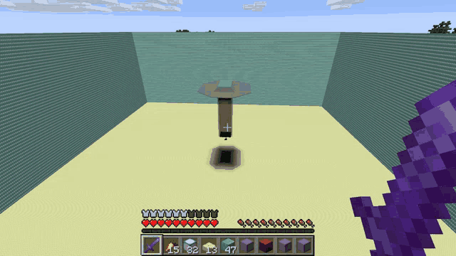a screenshot of a minecraft game shows a sword and a purple item