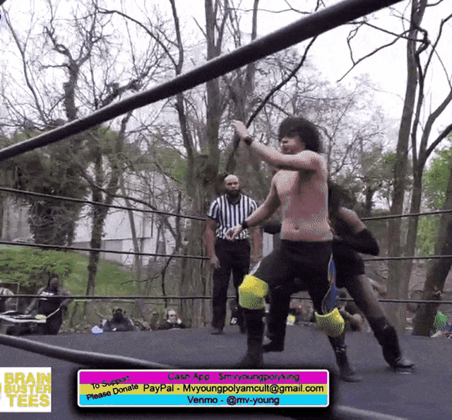 a man in a wrestling ring with a brain buster tee on it