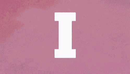 the word here is written on a pink and black background .