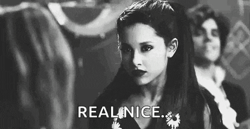 a black and white photo of ariana grande with the words `` real nice '' written on the bottom .