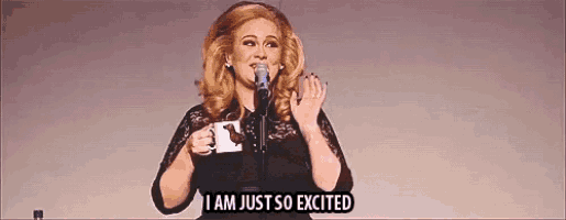 a woman is singing into a microphone while holding a cup of coffee and says i am just so excited .