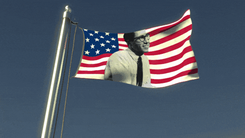 an american flag with a picture of a man in glasses on it