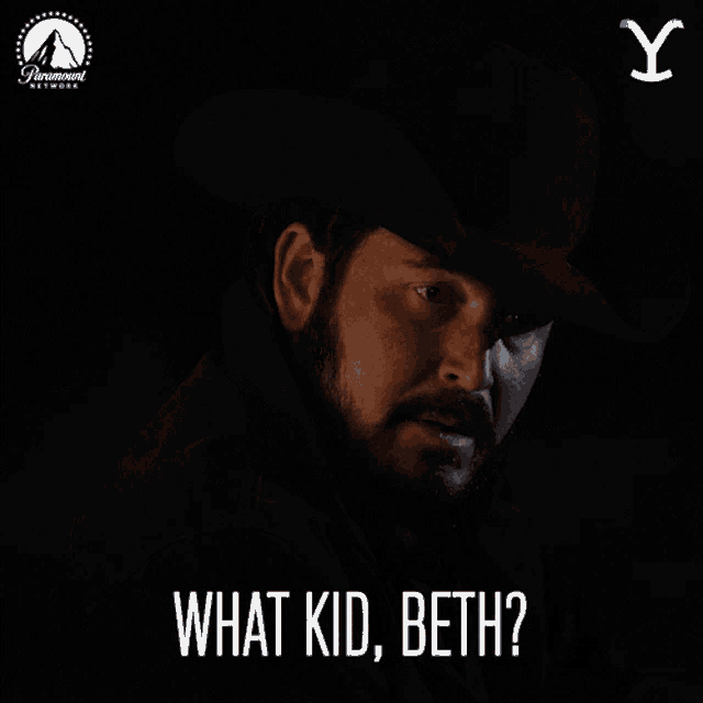 a man in a cowboy hat holds a gun and says what kid beth
