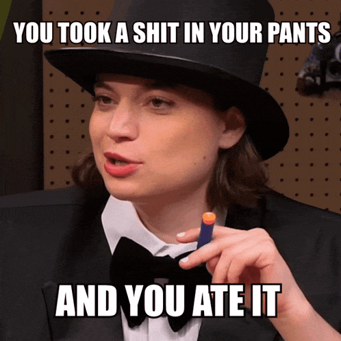 a woman in a top hat and bow tie is holding a dart and says you took a shit in your pants
