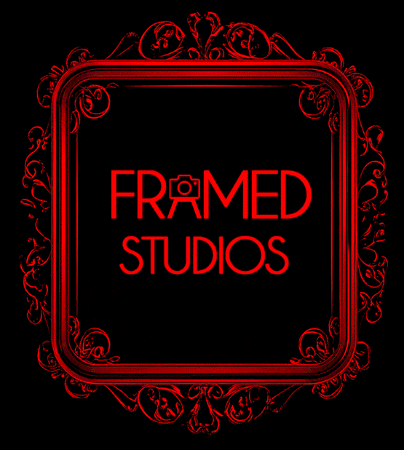 a green frame with the words framed studios written on it