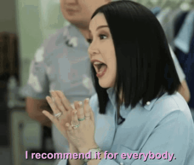 a woman says " i recommend it for everybody " in pink letters