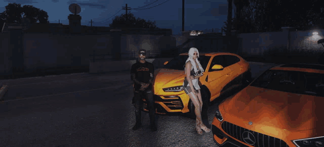 a man and a woman are standing in front of a yellow car that says mercedes benz