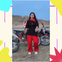 a woman in red pants and a black shirt is standing in front of motorcycles ..