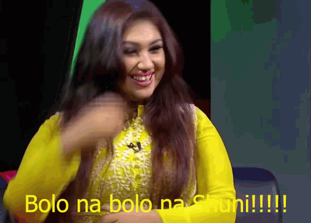 a woman in a yellow shirt is smiling with the words bolo na bolo na shuhi