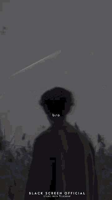 a black screen of a man standing in a field with the words thana vasva written on it