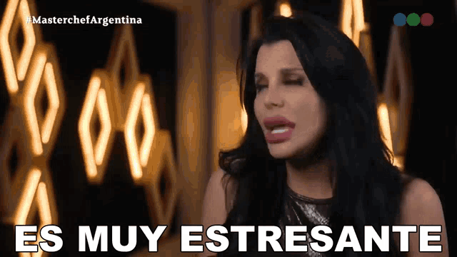 a woman says " es muy estresante " in front of a sign that says masterchef argentina