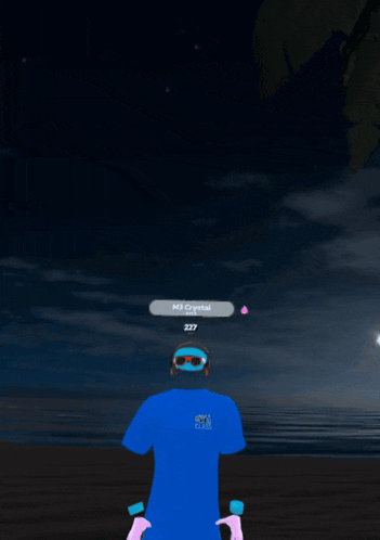 a person wearing a blue shirt with m3 crystal written on it