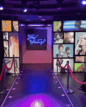 a stage with a sign that says " stay beautiful " on it