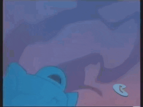 a cartoon character in a batman costume is stuck in the ground .