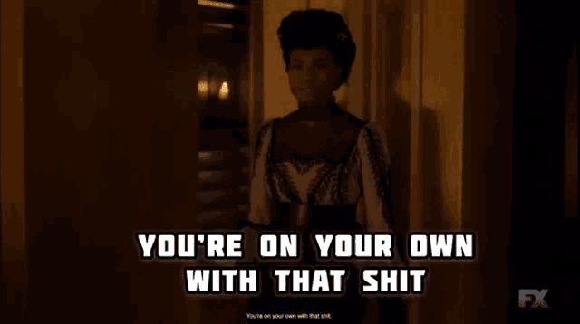a woman is standing in a dark room with the words " you 're on your own with that shit " above her