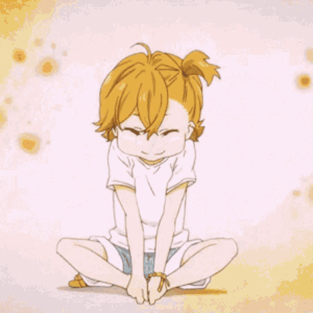 a little girl with blonde hair is sitting in a lotus position with her legs crossed