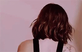 Dakota Johnson Hairflip GIF - Dakota Johnson Hairflip GIFs