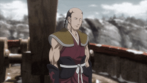 a bald man in a kimono stands in front of mountains