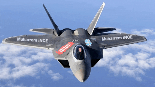 a fighter jet with the words muharrem inge written on the wing