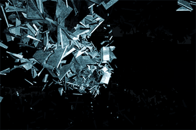 a black background with a lot of pieces of glass flying around