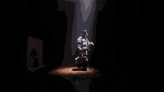 a man singing into a microphone in a dark room with a bag that says ' supreme ' on it