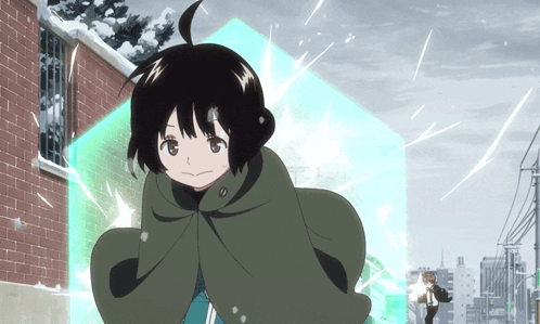 a girl in a green cape is standing in front of a brick building