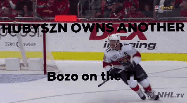 a hockey player on the ice with the words buzo on the tl below him