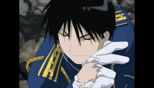 a close up of a person wearing a blue uniform and white gloves