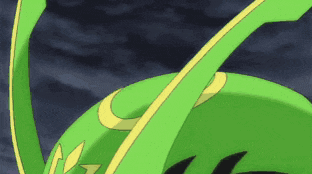 a close up of a green and yellow cartoon character 's head .