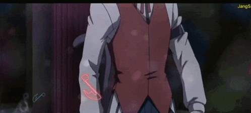 a man in a suit and tie is pointing his fingers at something