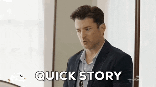 a man in a suit is standing in front of a window and says `` quick story '' .