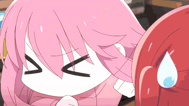 a girl with pink hair is making a funny face with her eyes closed