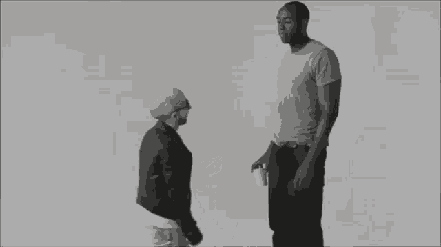 a black and white photo of a man and a woman